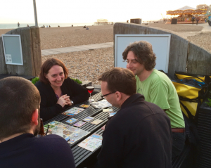 PLSIG members playing games on the beach in Brighton at a face-to-face meeting