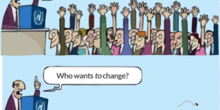 Who wants change? Crowd with hands up. Who wants to change? Crowd without hands up.